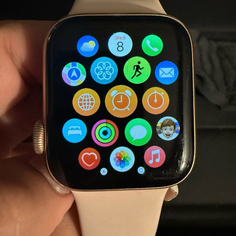 Apple Smartwatch with Gold Case and Cream Band